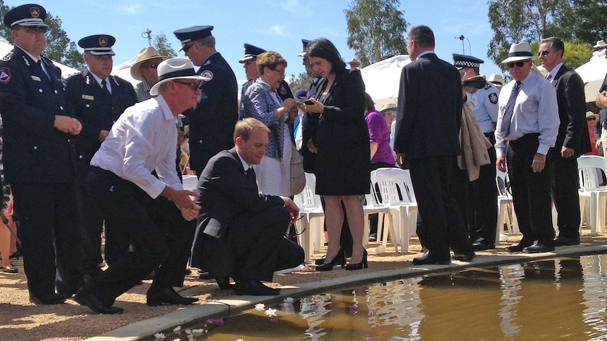The 10th anniversary of the disaster has been marked with a low-key service at the ACT Bushfire Memorial.