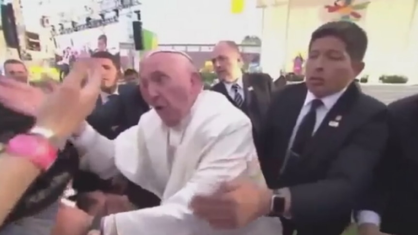 Pope Francis remonstrates with a parishioner in Mexico.