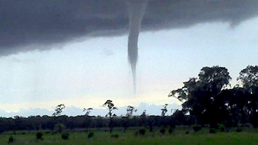 A water spout descends from the clouds near Stockton