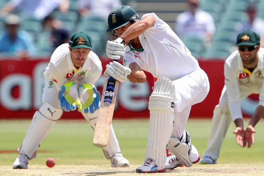 Gritty innings... Faf du Plessis hits a shot on the final afternoon.