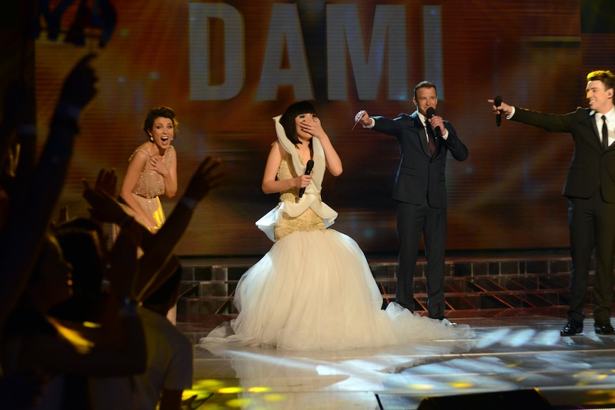 Dami winning X Factor in 2013.