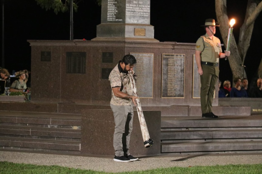 Didgeridoo player at Anzac Day 2021 in Darwin. 