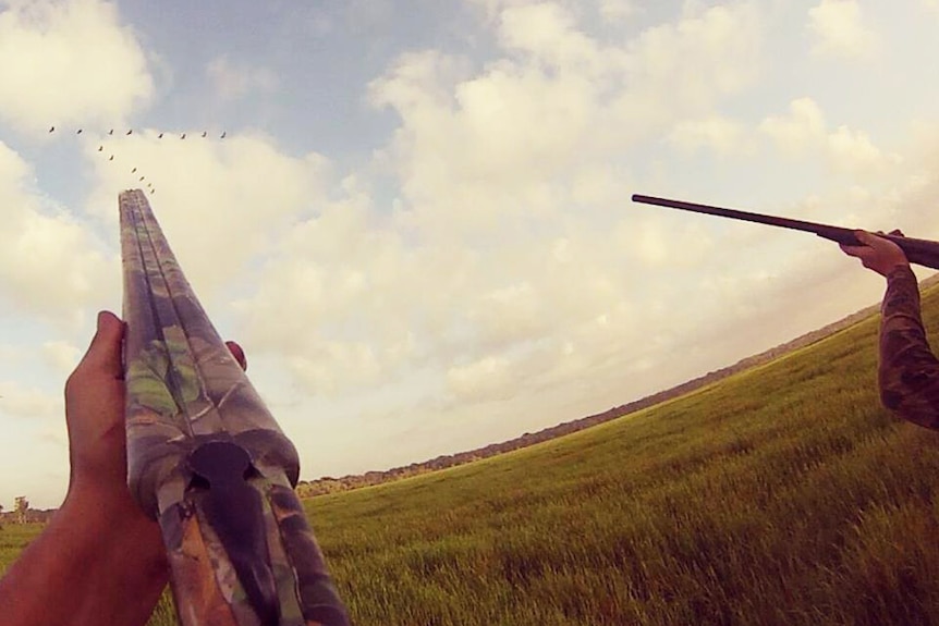 Hunters take aim at magpie geese, during waterfowl season in the Northern Territory.