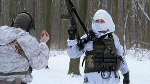 Two soldiers facing each other, snow in background, one holding a gun