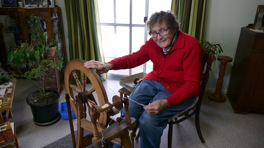 Eileen Douglas at her wool spinning wheel