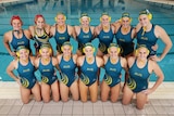 The Australian women's Olympic water polo team pose at Sydney Olympic Park Aquatic Centre.