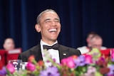 US President Barack Obama laughs at the 102nd White House Correspondents' Association Dinner in Washington DC.