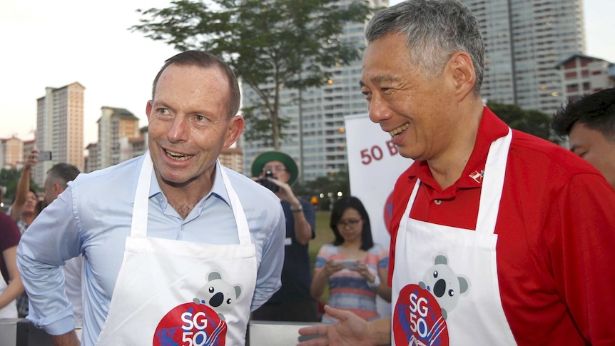 Tony Abbott at a barbecue with Lee Hsien Loong