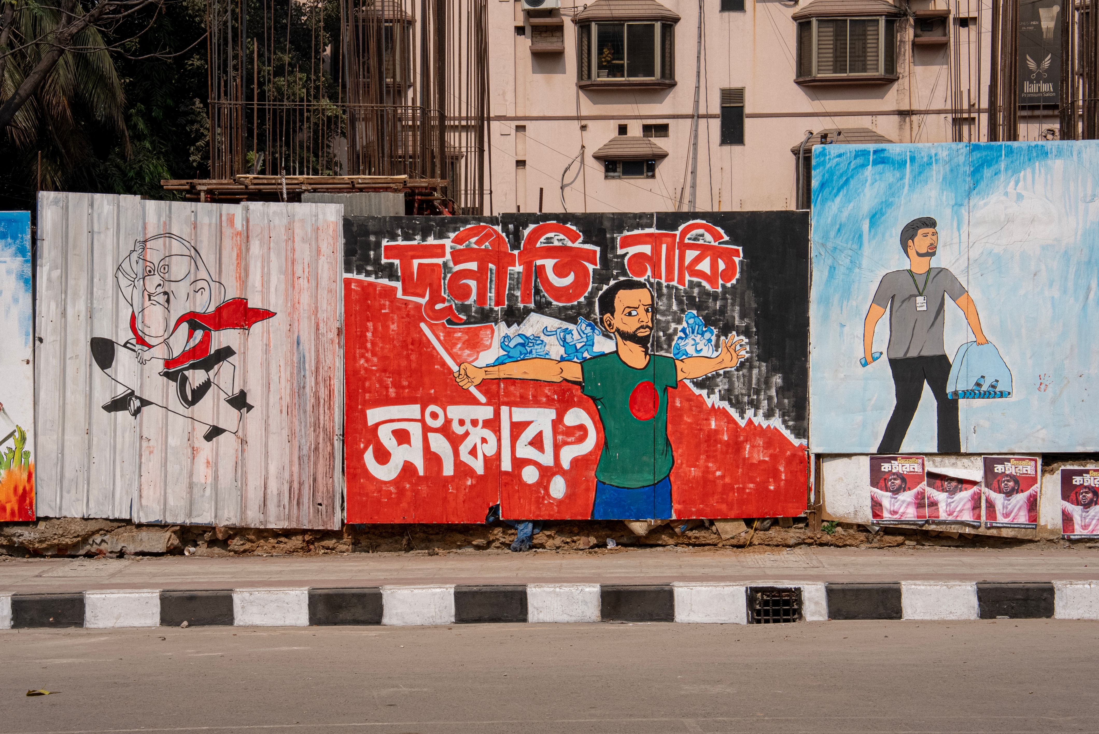 Graffiti of the young men and women on the walls of a building in Bangladesh.