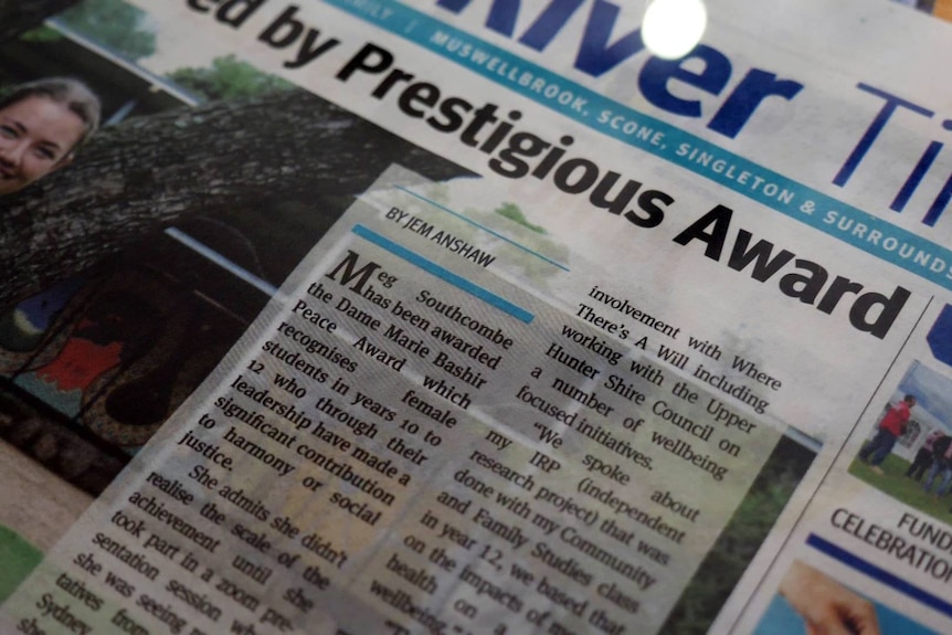 Close up of a newspaper article about Meg Southcombe's Marie Bashir Award win