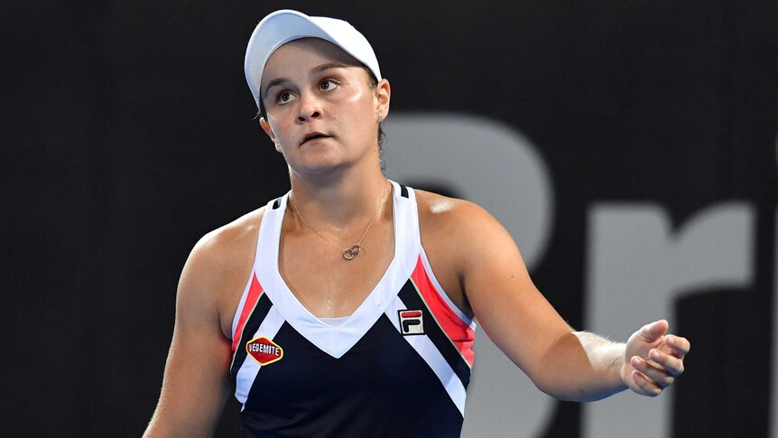 Ashleigh Barty of Australia reacts to a point against Lesia Tsurenko at the Brisbane International.
