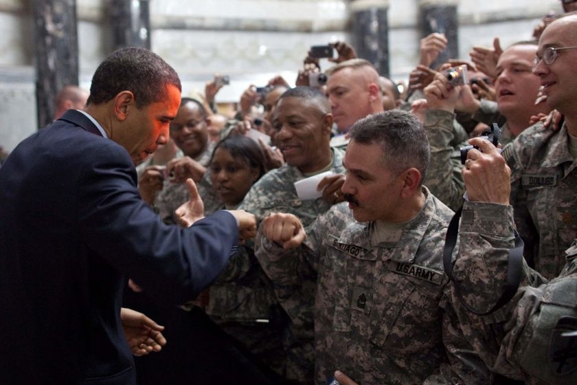 President Barack Obama fist-bumps a U.S. soldier at Camp Victory in Baghdad, April 7, 2009.