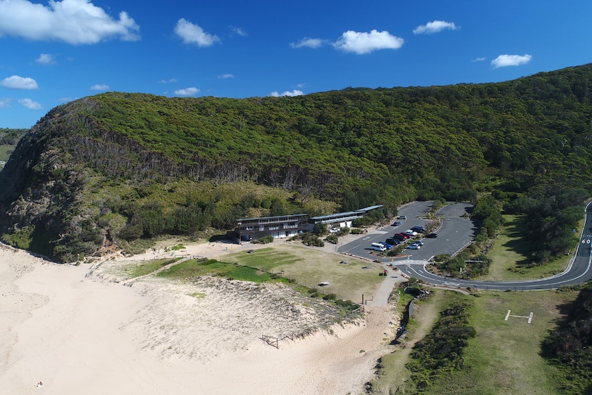 Garie beach as seen from a drone, showing the beach and car park.