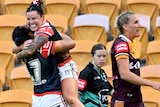 Jayme Fressard celebrates a Roosters try