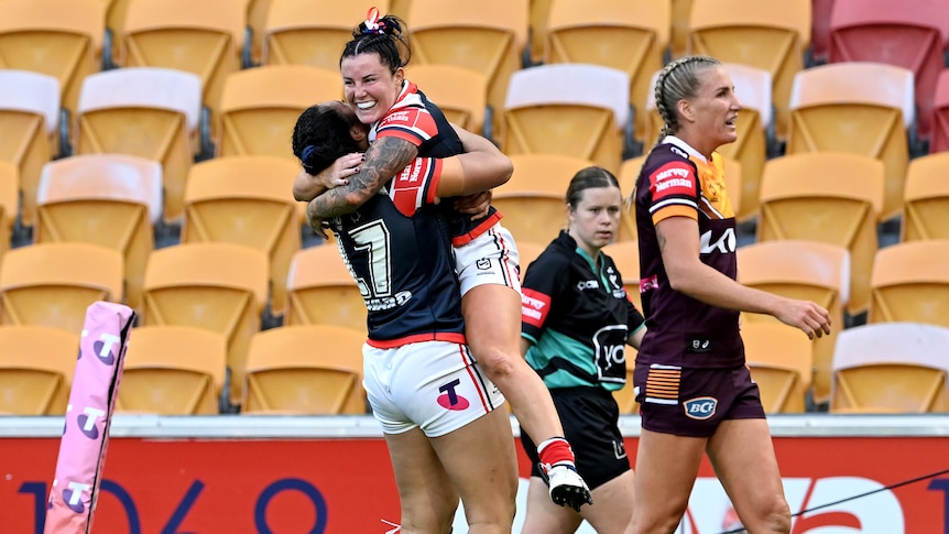 Jayme Fressard celebrates a Roosters try