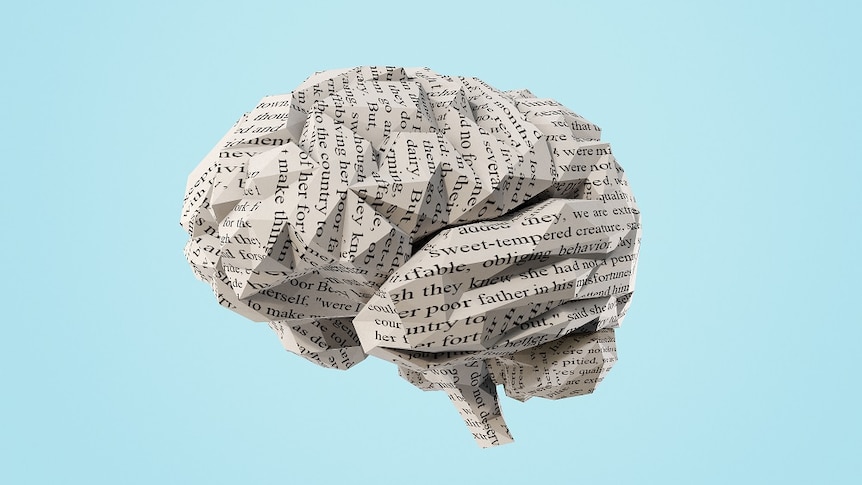 Origami brain made of paper with text.