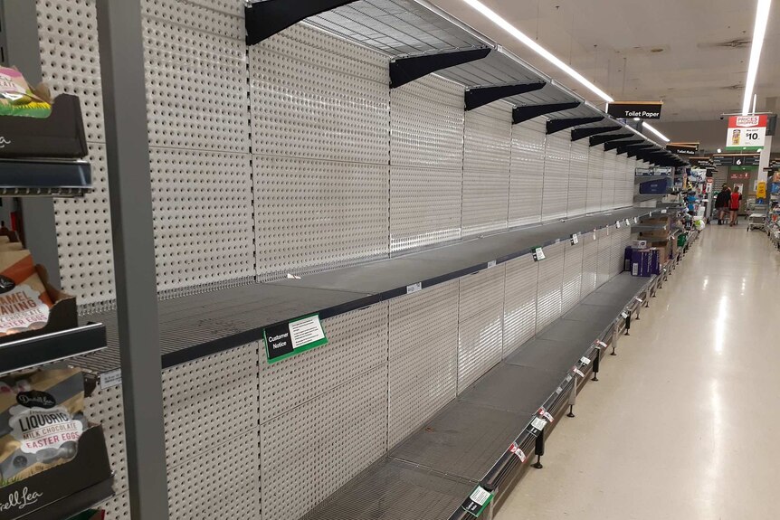 A supermarket aisle stripped bare.