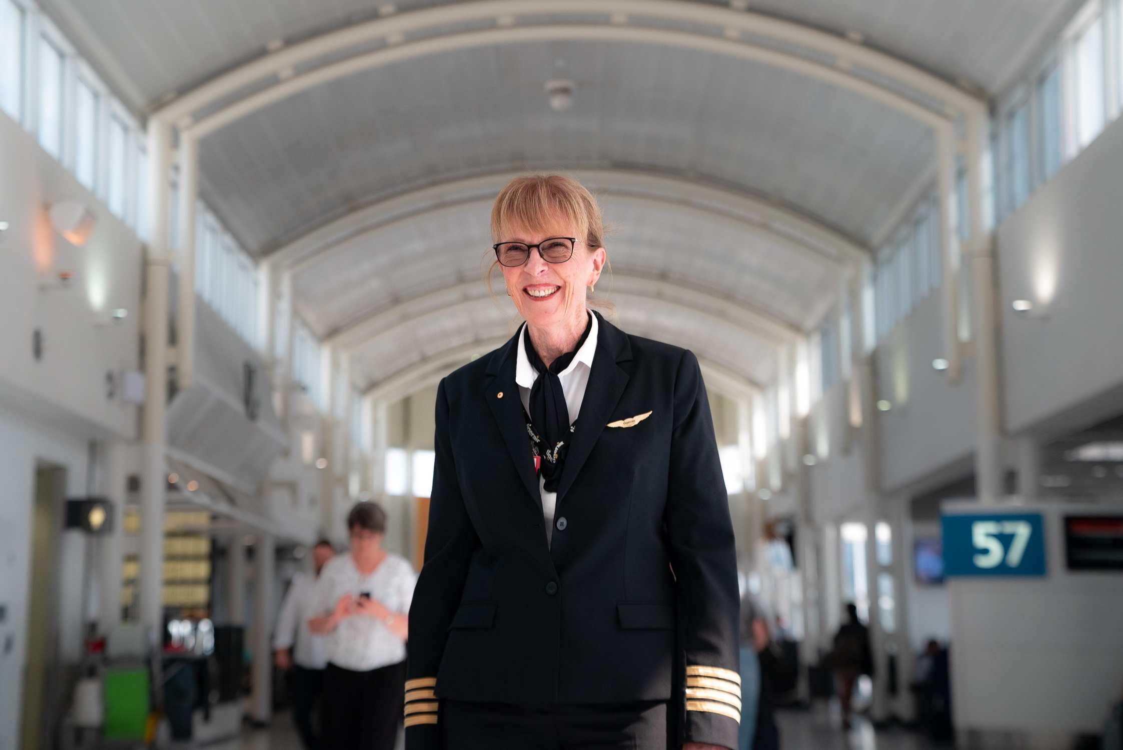 Pilot Deborah Lawrie smiling at airport
