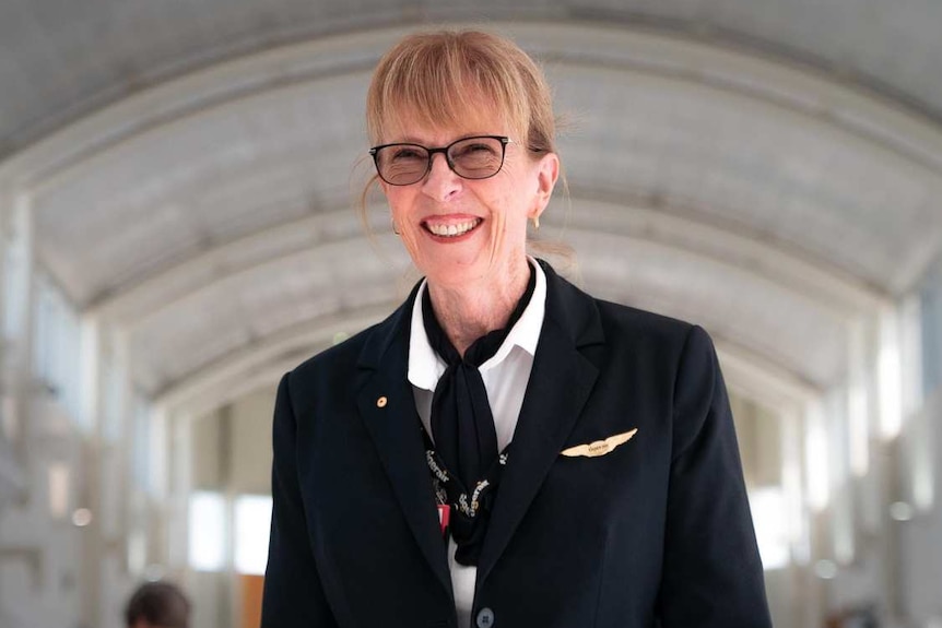 Pilot Deborah Lawrie smiling at airport