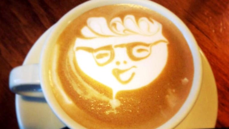 Kevin Rudd likeness made in cup of coffee.