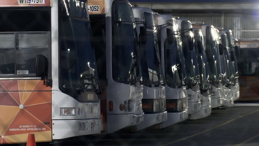 A line of buses parked inside the depot of CDC Victoria at Wyndham.