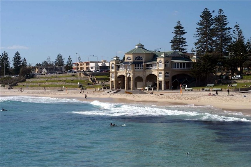 People swim at Cottesloe Beach