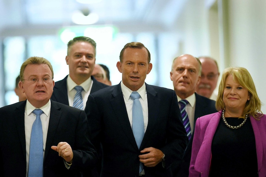 PM and supporters leave party room