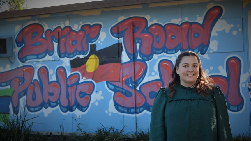 A mural says 'Briar Road Public School' and shows the Aboriginal flag.