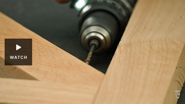 A drill being used on the corner pieces of wood. Has Video.
