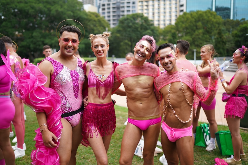 A group of people dressed in pink