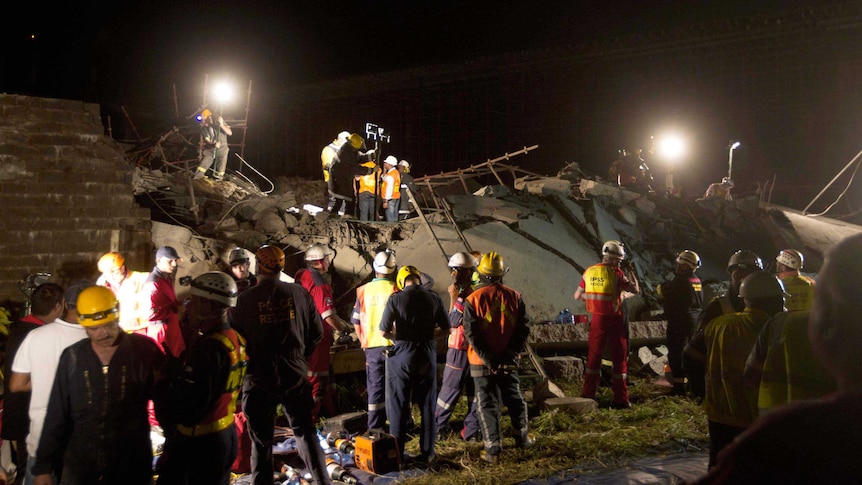 Emergency workers search for survivors after Durban building collapse