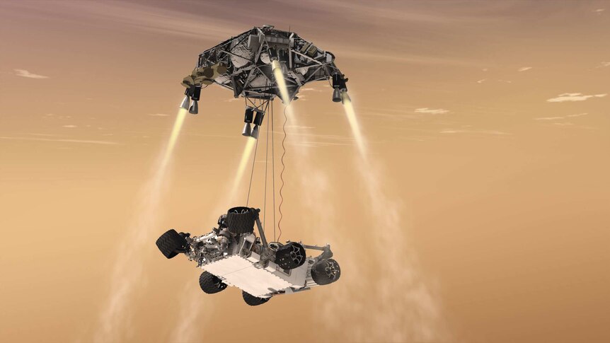 A computer generated image of the Sky Crane landing of the Mars Curiosity rover.
