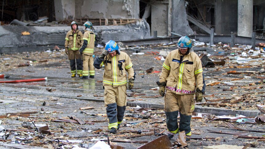 Rescue workers in Oslo ruins
