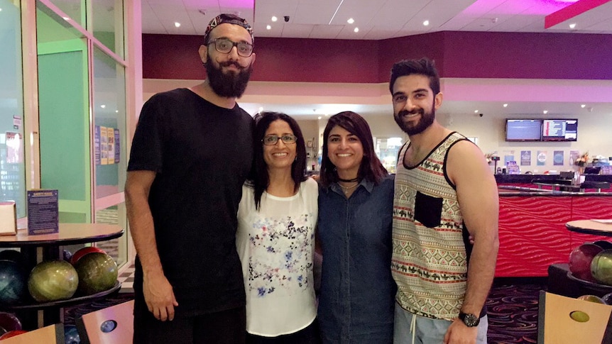 Writer and poet Zohab Zee Khan with his mum, sister and brother, a family who is separated during the coronavirus pandemic.