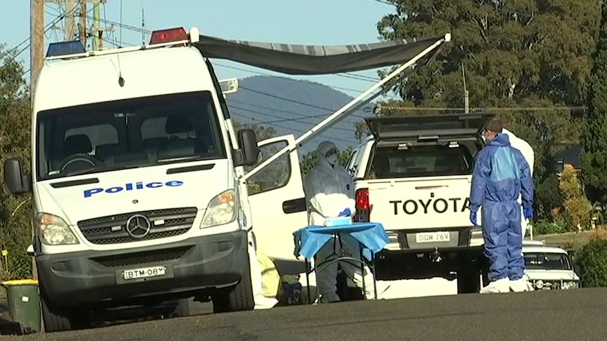 Forensic police at the scene in Taree after the shooting.