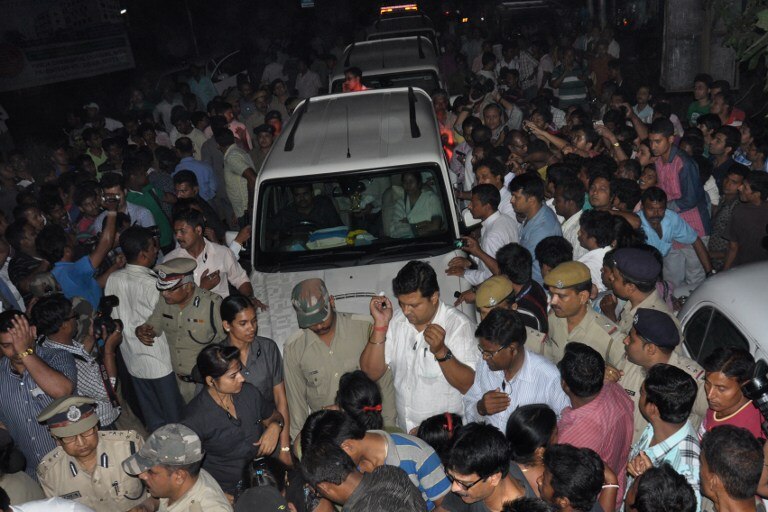 Protesters block the convoy of West Bengal chief minister Mamata Banerjee as she attempts to visit the nun.