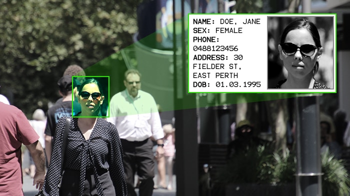 A woman walking through a crowd with her face focused on and matched against a card of information