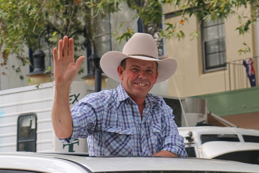 Country music artist Dean Perrett in a car