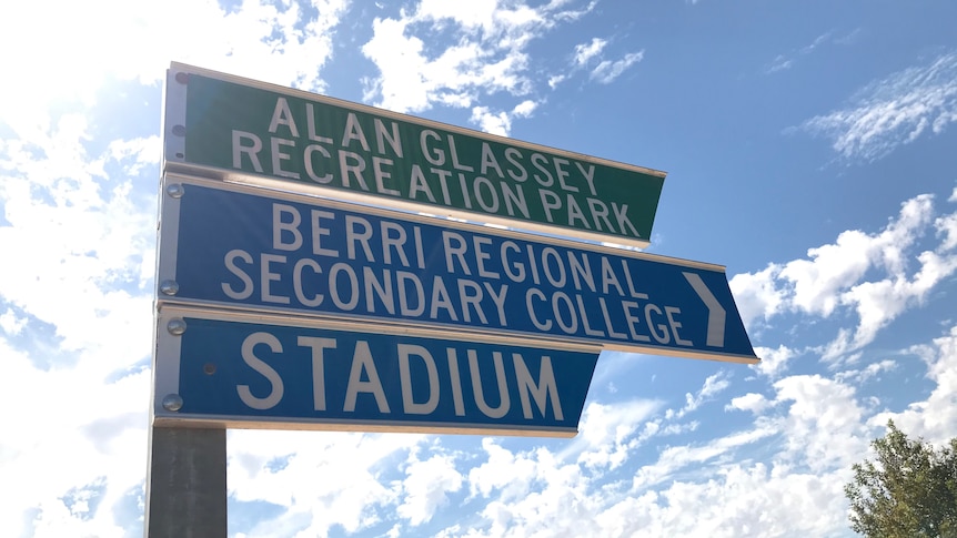 A pole with three signs, one for Alan Glassey Recreation Park, another Berri Regional Secondary College and one for a Stadium.