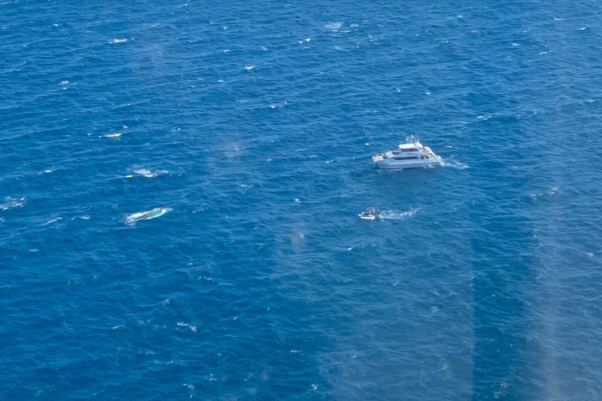 An aerial view of vessels at sea.