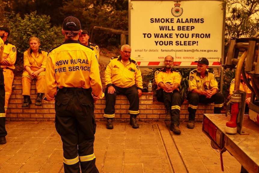 Narooma RFS sit and stand at their headquarters.