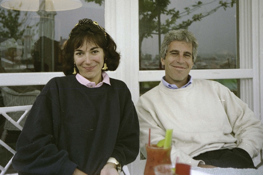 Ghislaine Maxwell and Jeffrey Epstein sitting together at a table with a bloody mary cocktail before them