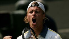 Lleyton Hewitt gets pumped up during his four-set win over Taylor Dent