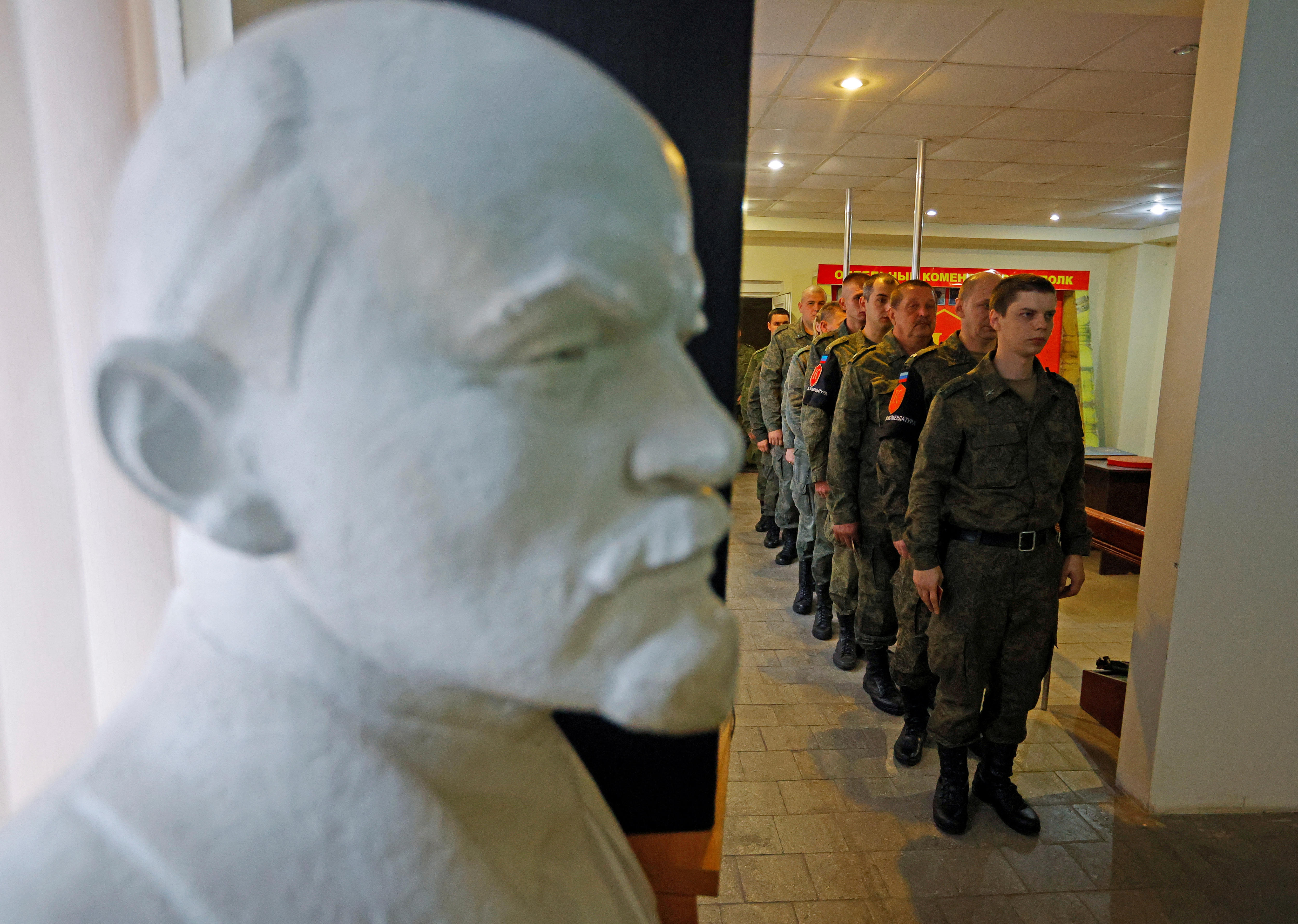 Soldiers line up to vote during a referendum