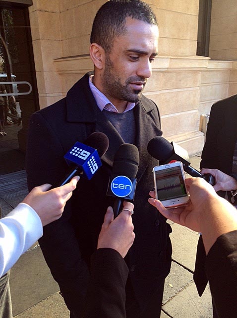 Bick Singh speaks outside an Adelaide court