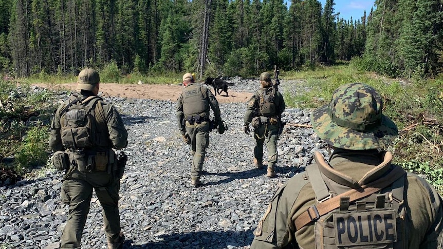 A crew of four police search remote Canadian bushland for fugitives.