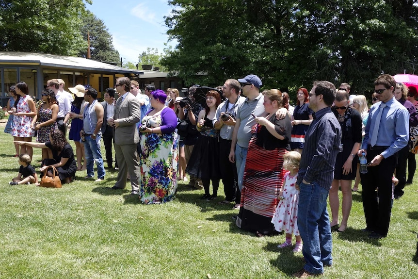 Family and friends gather for Mr Garcia and Mr Berry's wedding in Canberra.