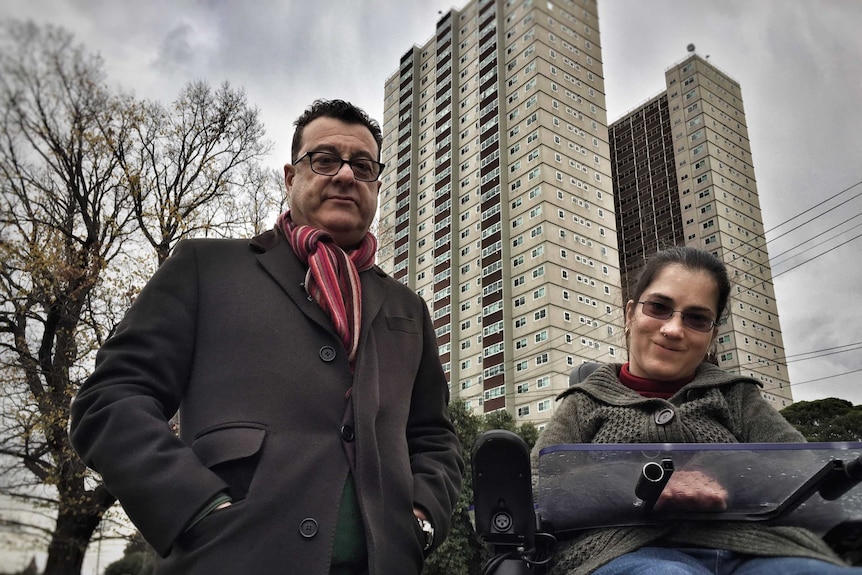 John Lowndes and Felice Vaiani in front of the Park Towers public housing building.