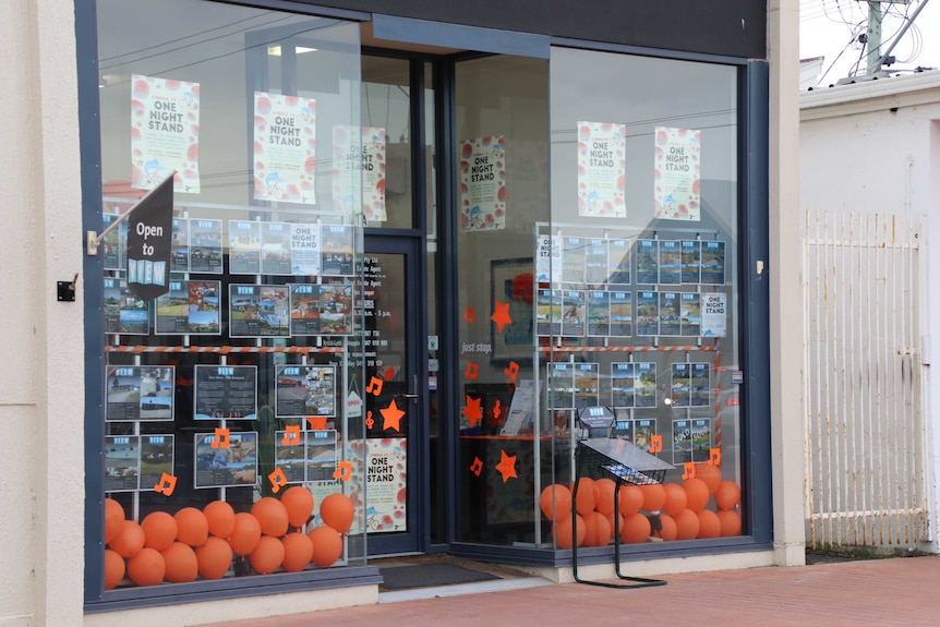 A St Helens shop decorated with orange in honour of the JJJ One Night Stand concert