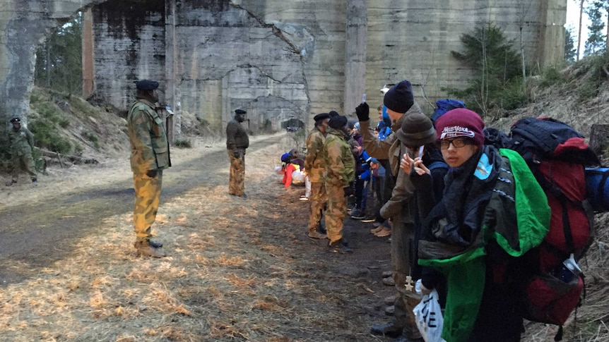 Children at a fake border crossing